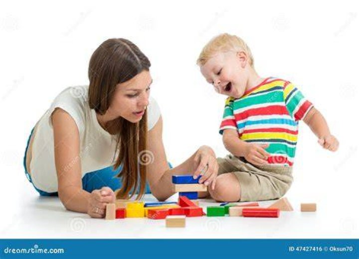 kid and his mom play toys together Stock Photo Alamy