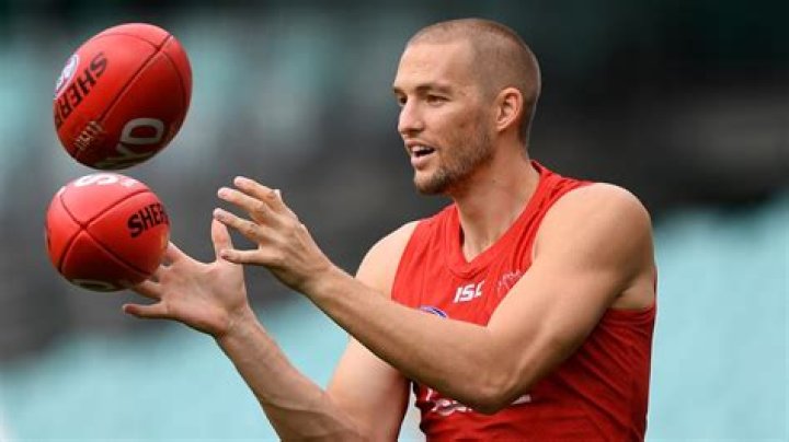 Sydney Swans star Sam Reid's wife Kim shares adorable photos of their