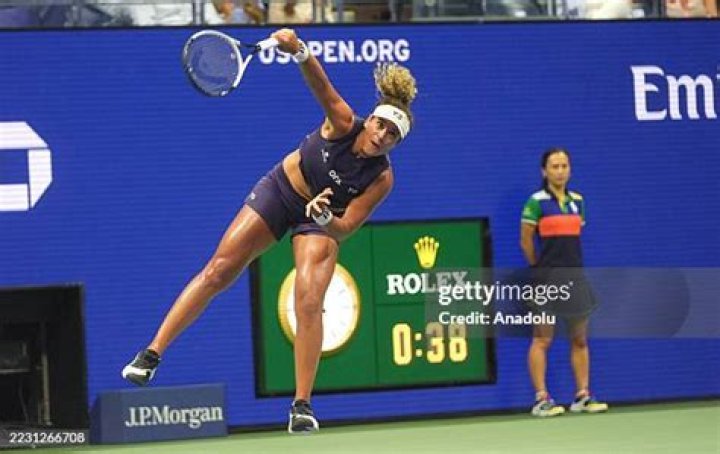 U.S. Open women's singles tennis champion Iga Swiatek poses at "Top of