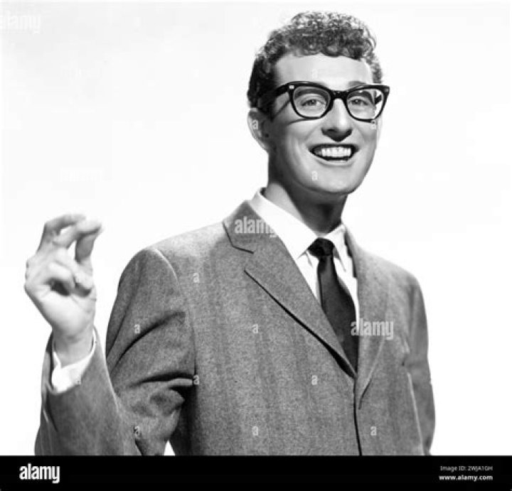 Who influenced Buddy Holly?